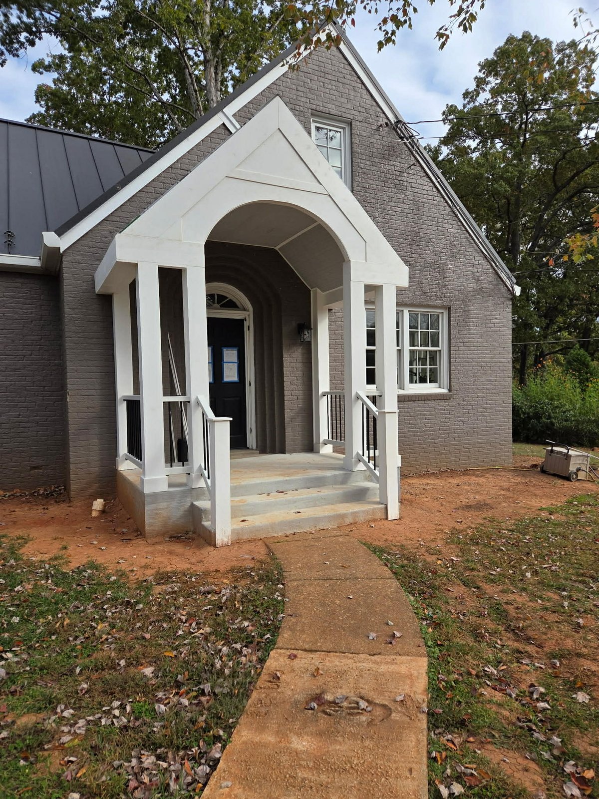 Completed porch addition with metal roof in Lynchburg VA